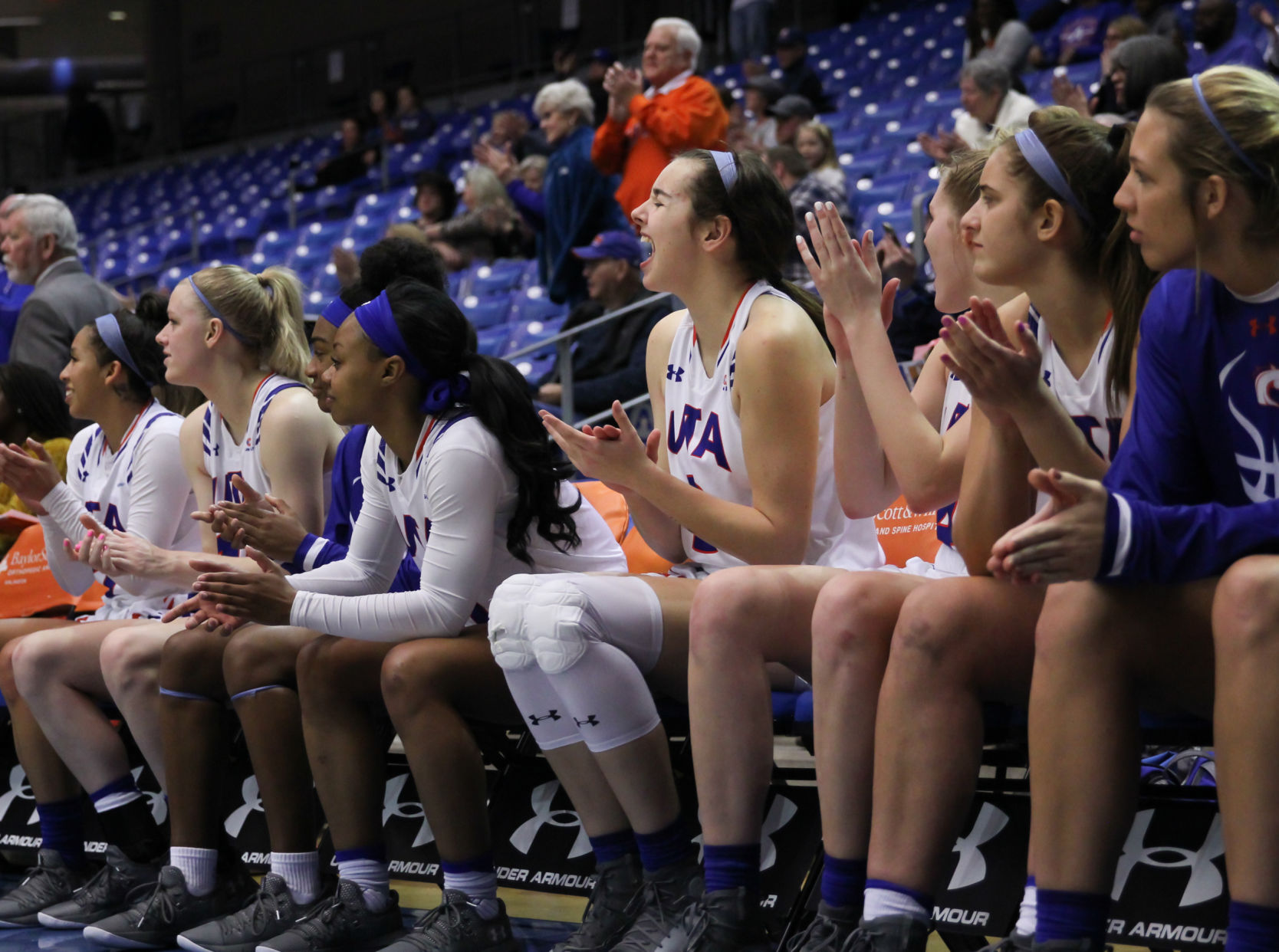 Women's and men's basketball teams set records, face adversity over winter break